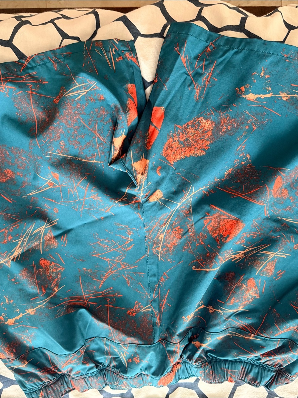 The North Face Teal Camisole with Orange Abstract Accents
